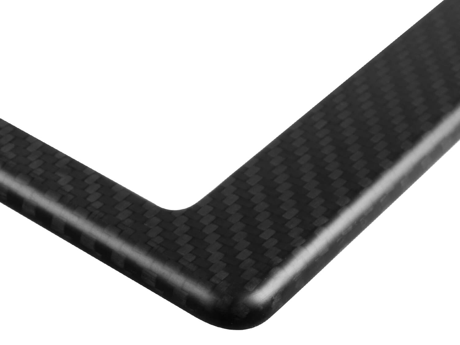 Detail view of matte 3K twill weave corner highlighting refined finish and premium construction