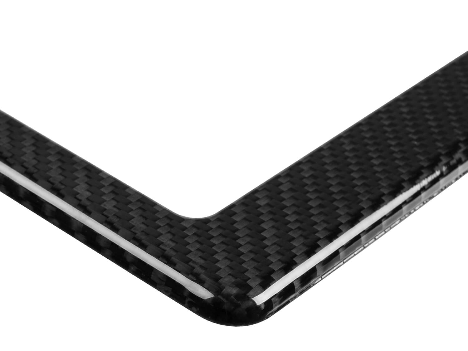 Close-up detail of genuine 3K twill weave carbon fiber corner highlighting premium construction and finish